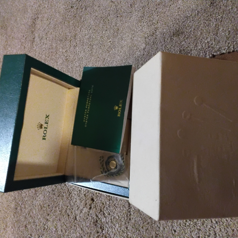 Rolex Watch Box with Green and Gold Accents